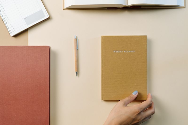 Warm overhead weekly planner and stationery